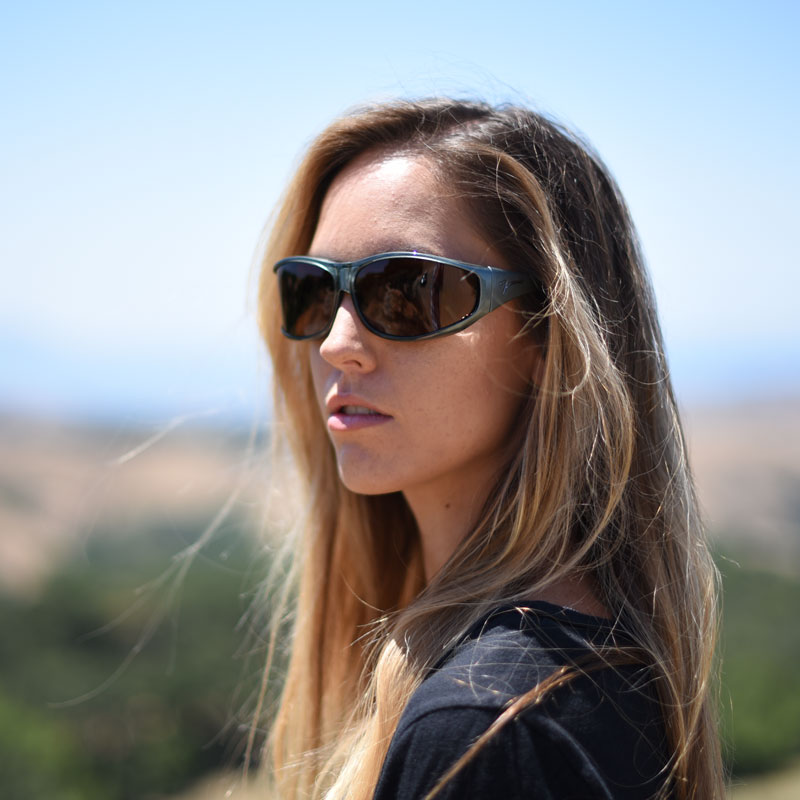 Jory Paul in polarized steel fitover sunglasses with copper lenses for maximum contrast.
