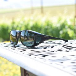 cocoons fitover sunglasses sitting on table