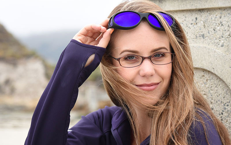 Here, Rachel is wearing blue mirrored lenses, which create a haven for the eyes against bright conditions.