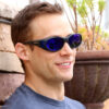 Mark wears polarized blue mirror cocoons over his sunglasses for sun protection and polarization.